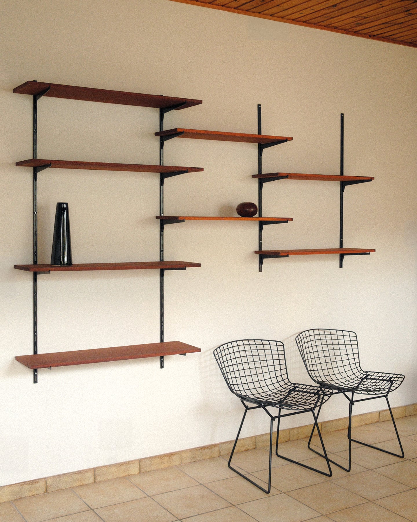Modular wall unit, teak veneer shelves and black metal uprights