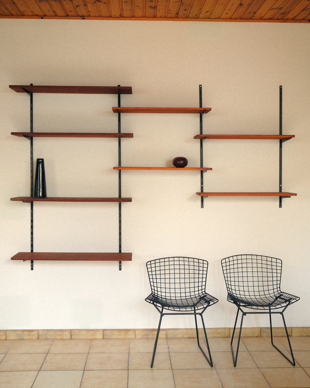 Modular wall unit, teak veneer shelves and black metal uprights