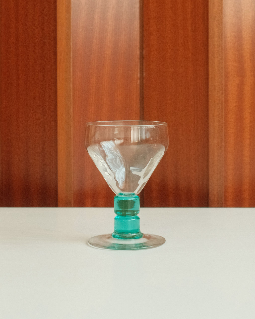 Two glasses with turquoise stems