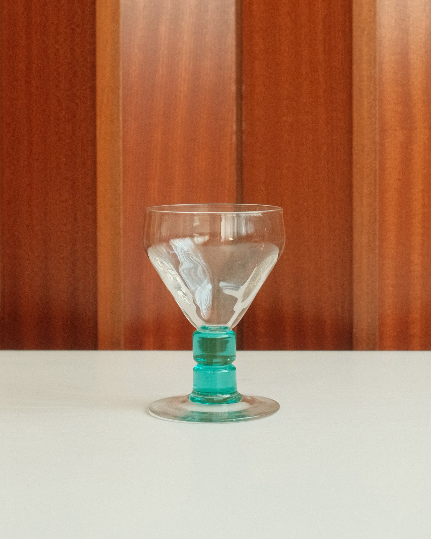 Two glasses with turquoise stems