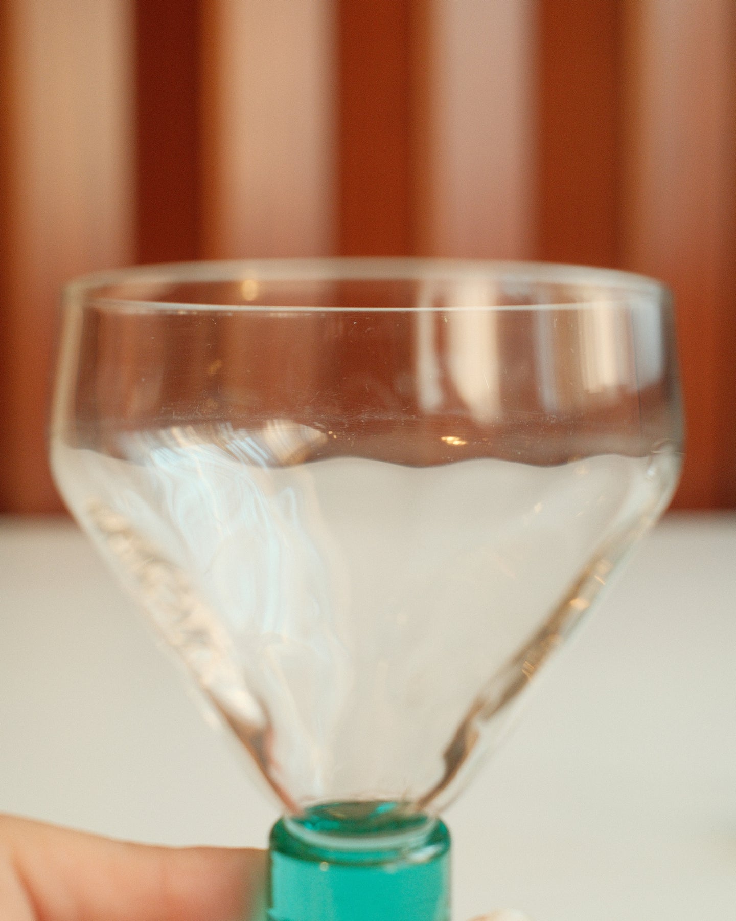 Two glasses with turquoise stems