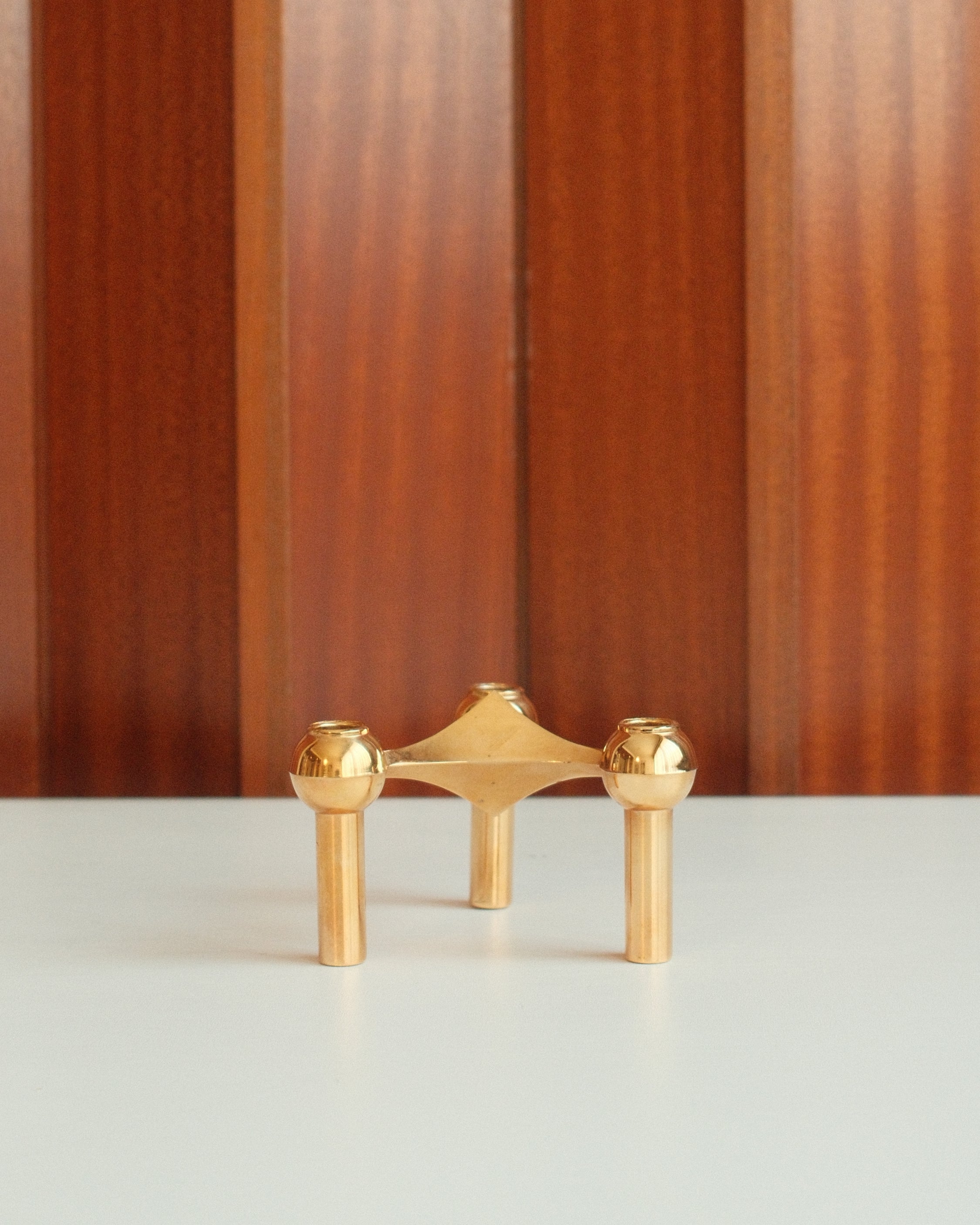 Modular candle holder in solid brass, Stoff Nagel