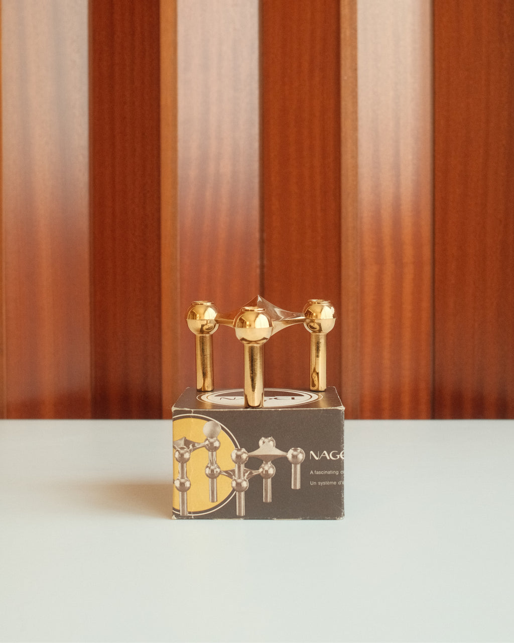 Modular candle holder in solid brass, Stoff Nagel