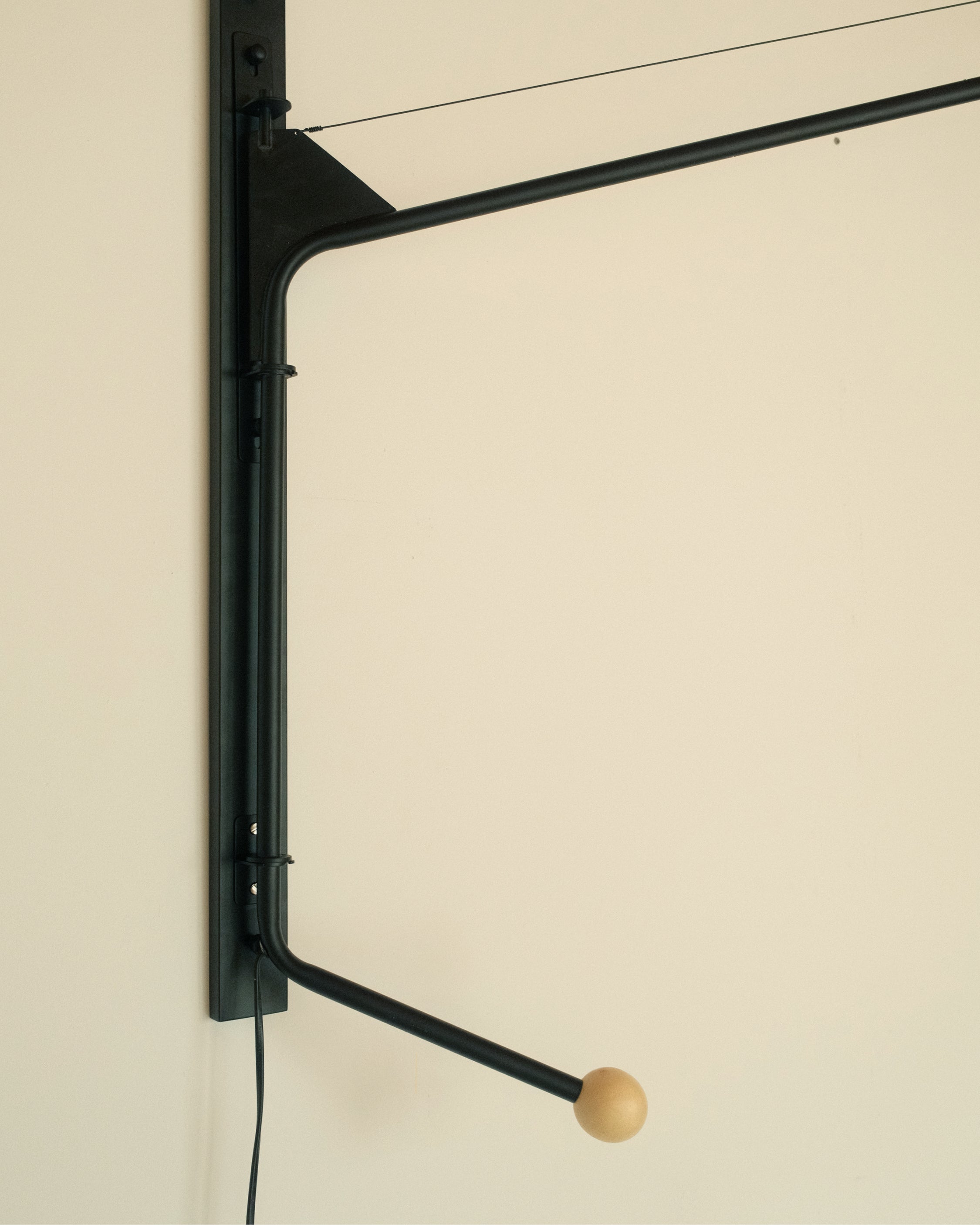 Wall-Mounted Swing Arm Lamp
