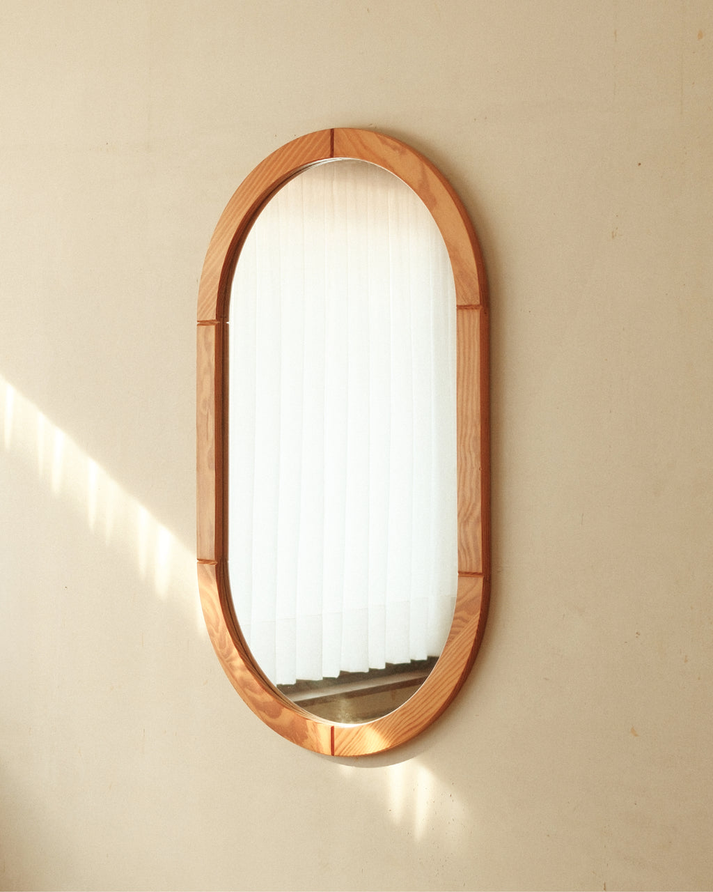 Rounded pine mirror