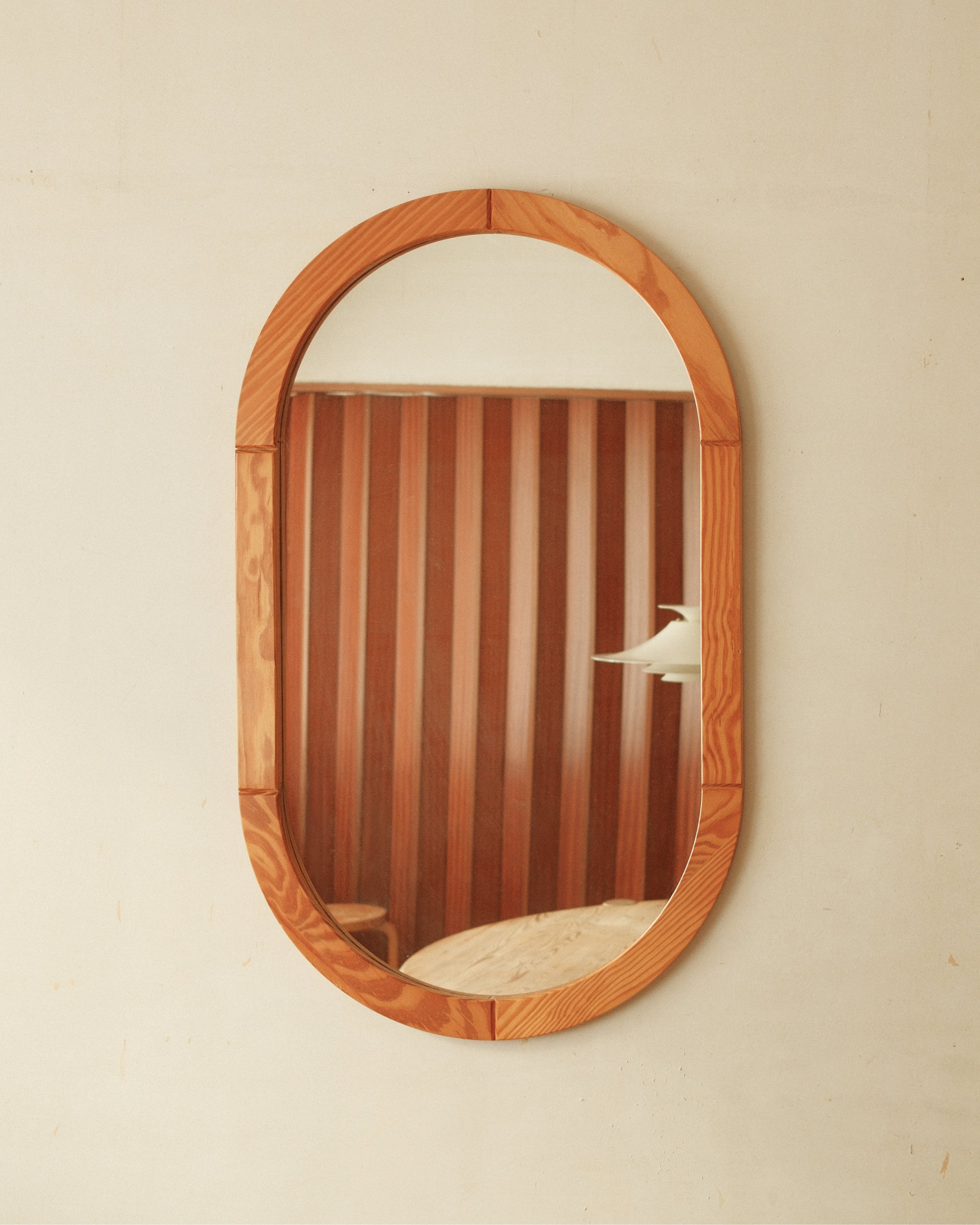 Rounded pine mirror