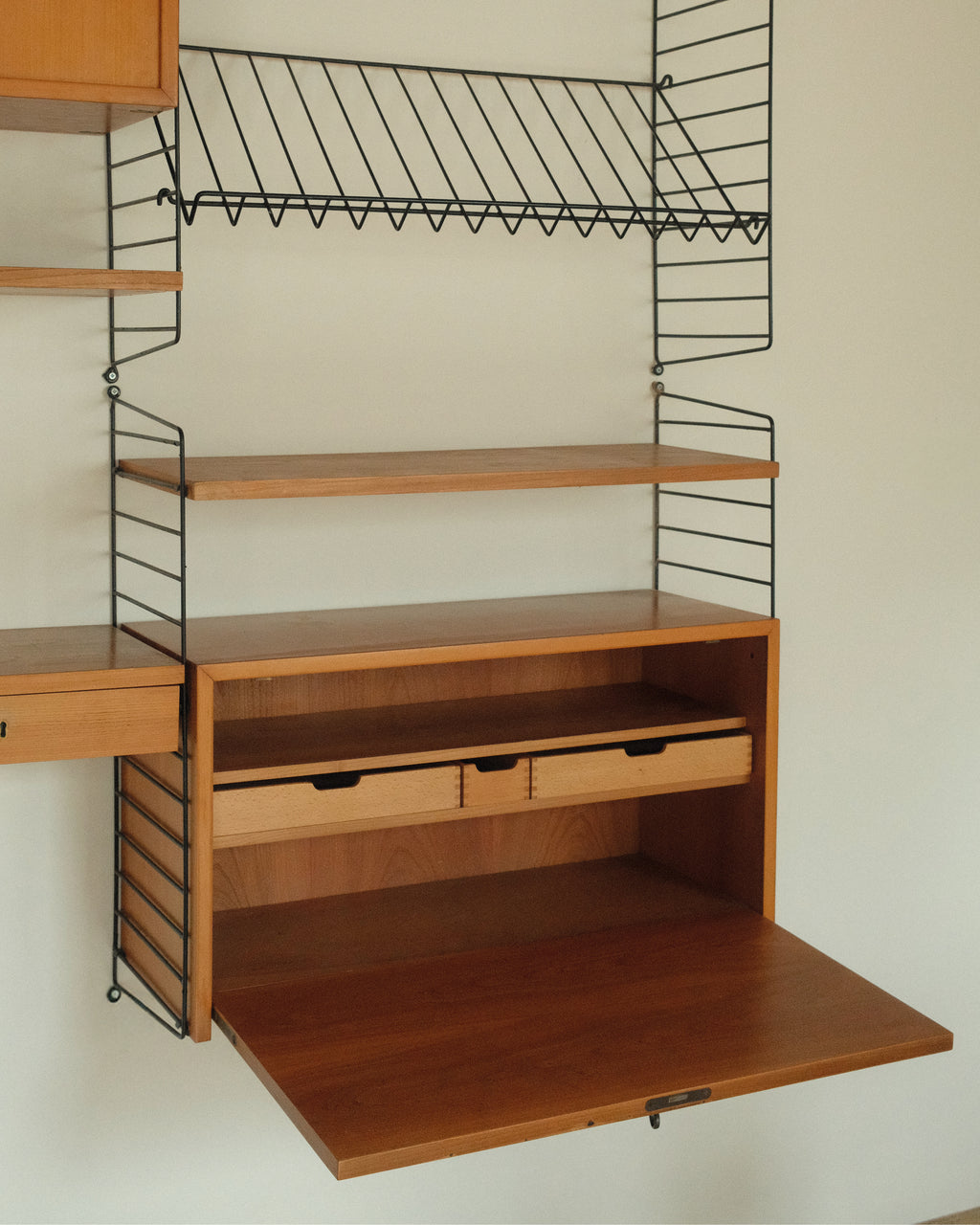 String Wall System, Veneer and Black Metal