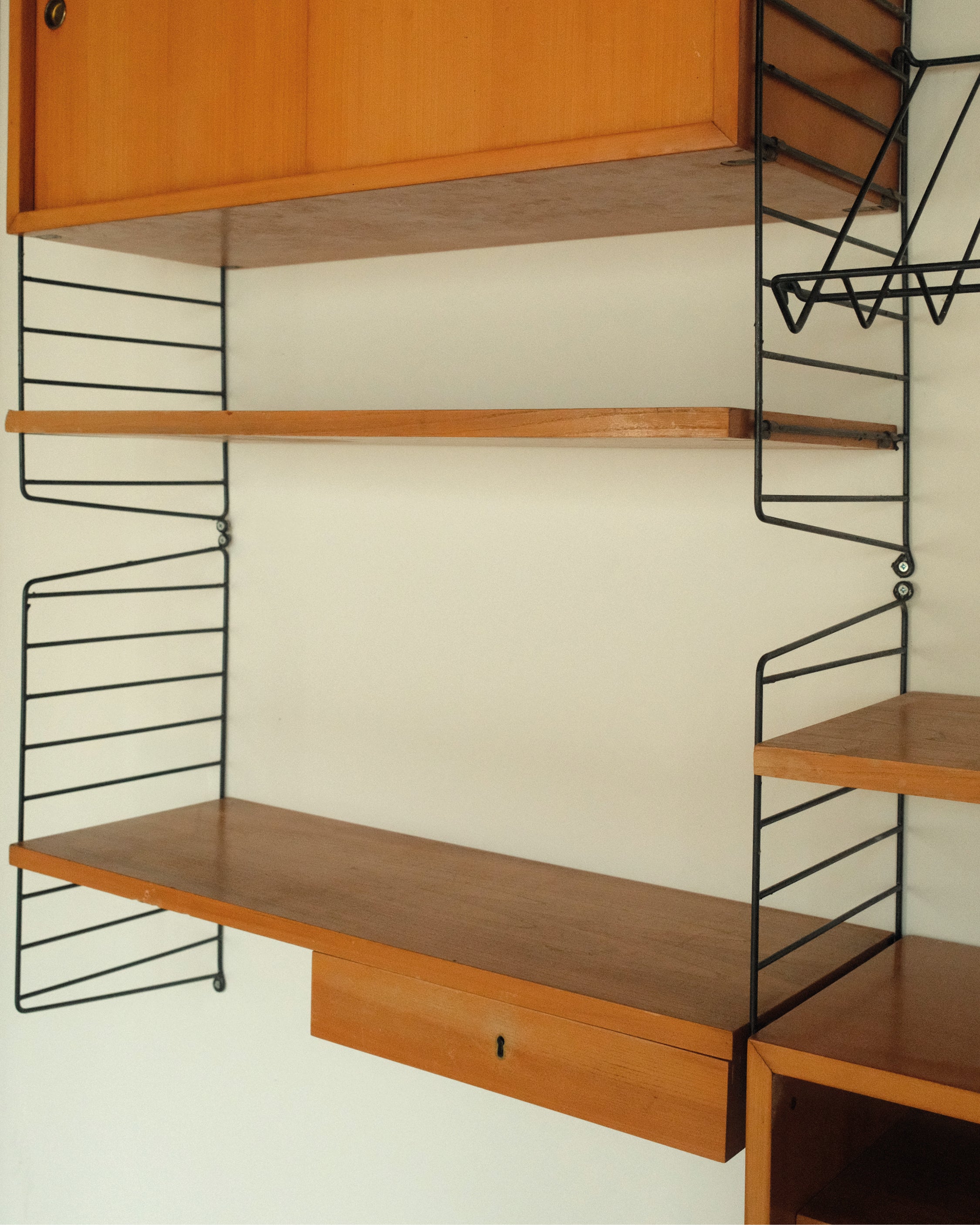 String Wall System, Veneer and Black Metal