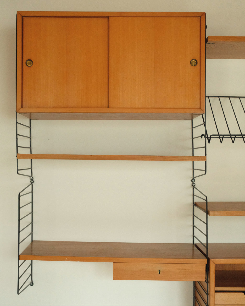 String Wall System, Veneer and Black Metal