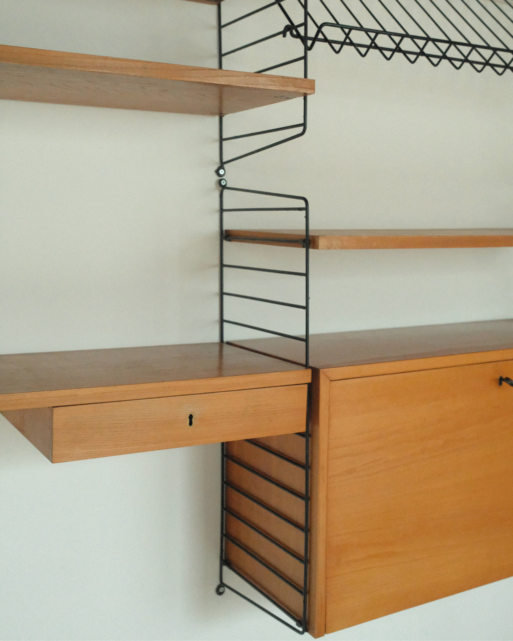 String Wall System, Veneer and Black Metal