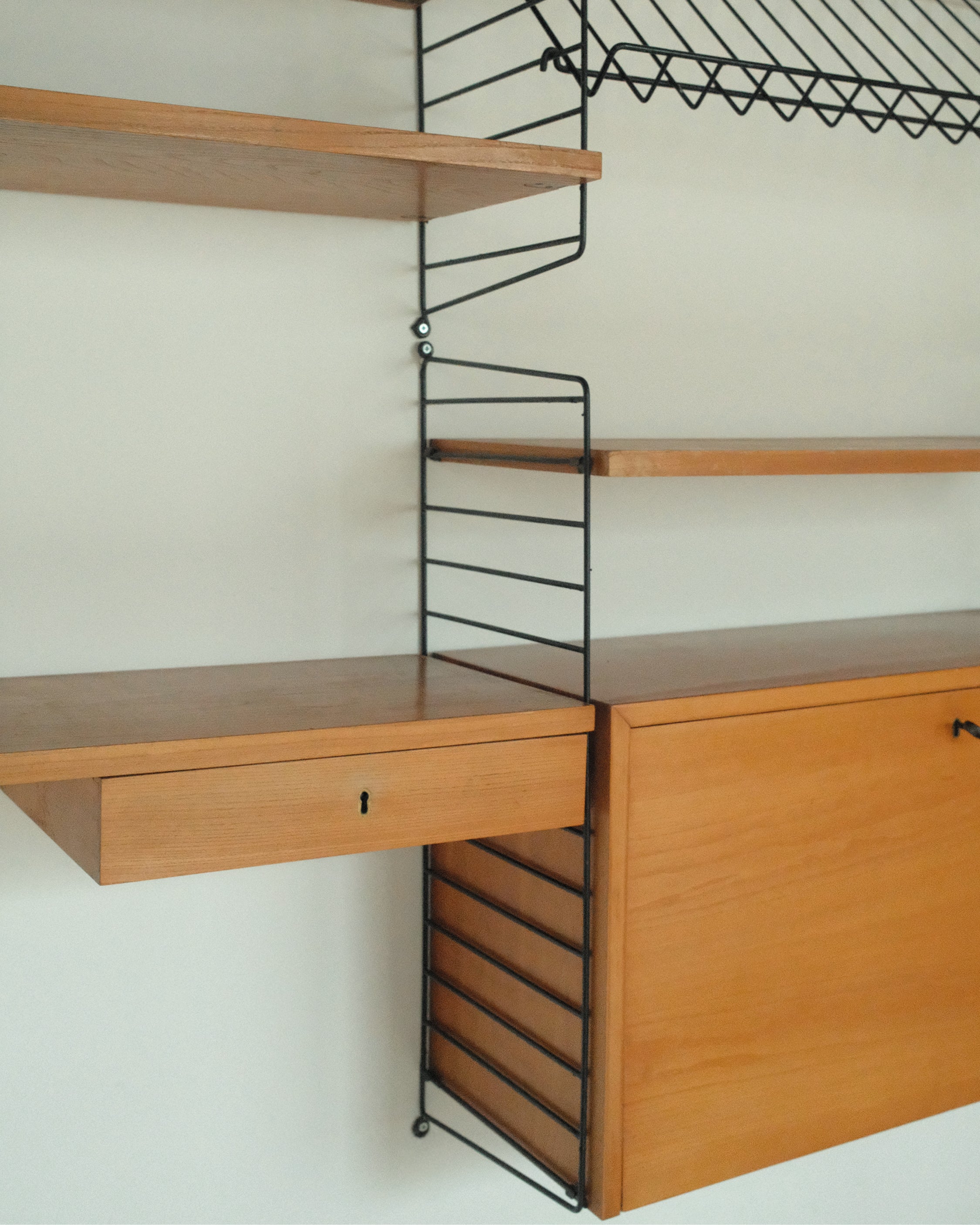 String Wall System, Veneer and Black Metal