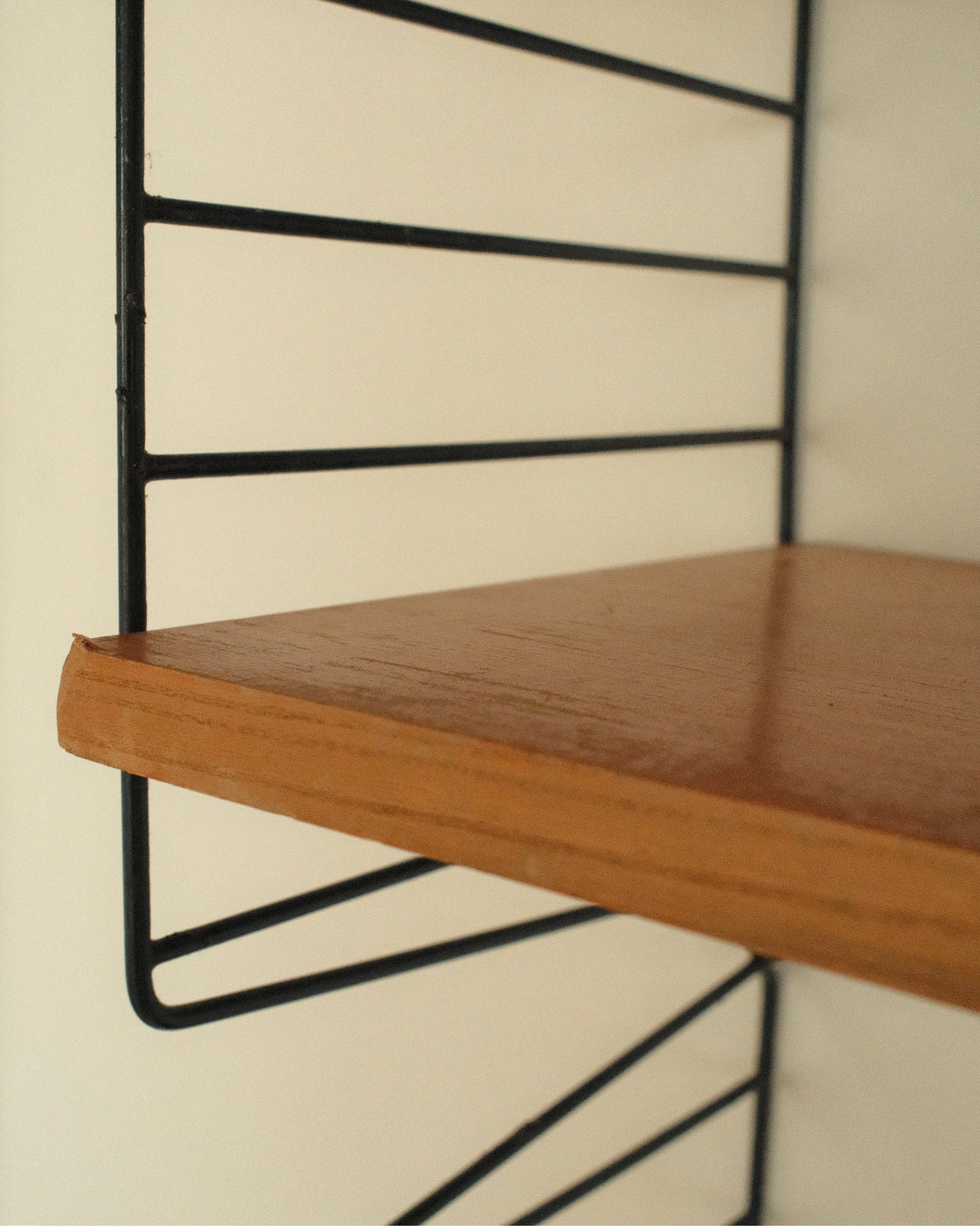 String Wall System, Veneer and Black Metal