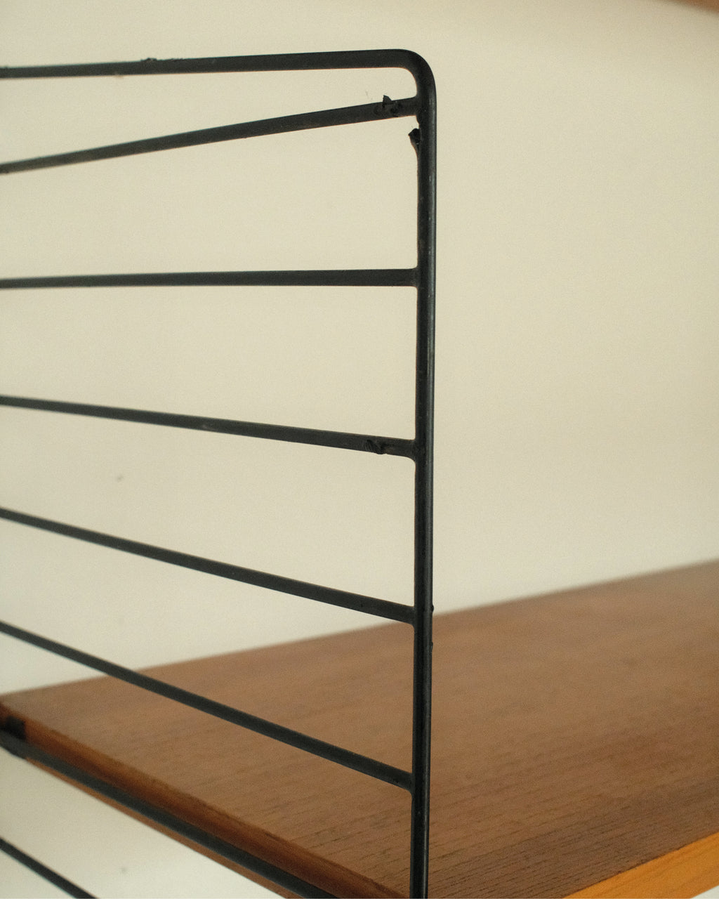 String Wall System, Veneer and Black Metal