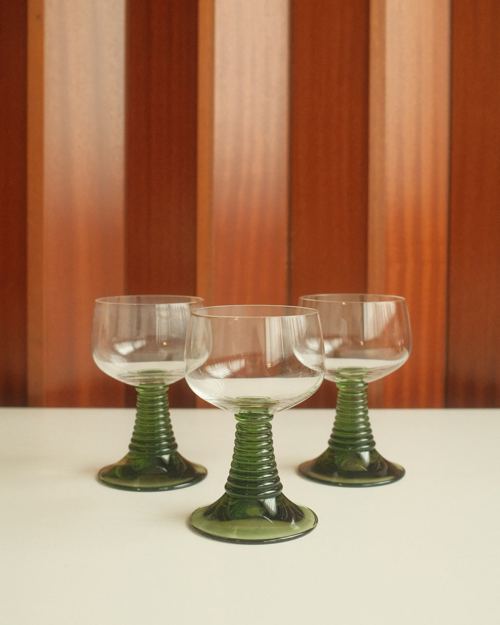 Six Roemer wine glasses with green stem