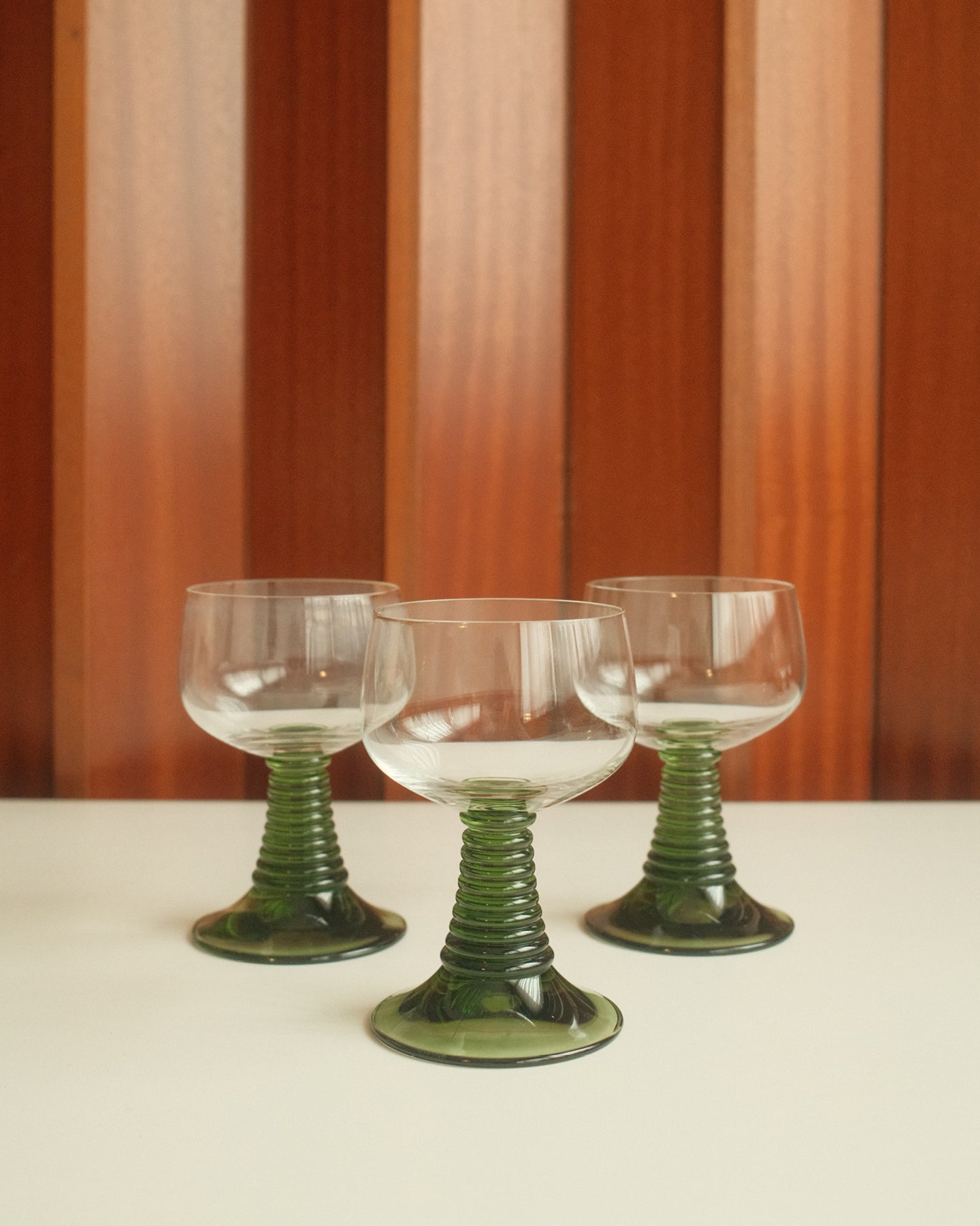 Six Roemer wine glasses with green stem