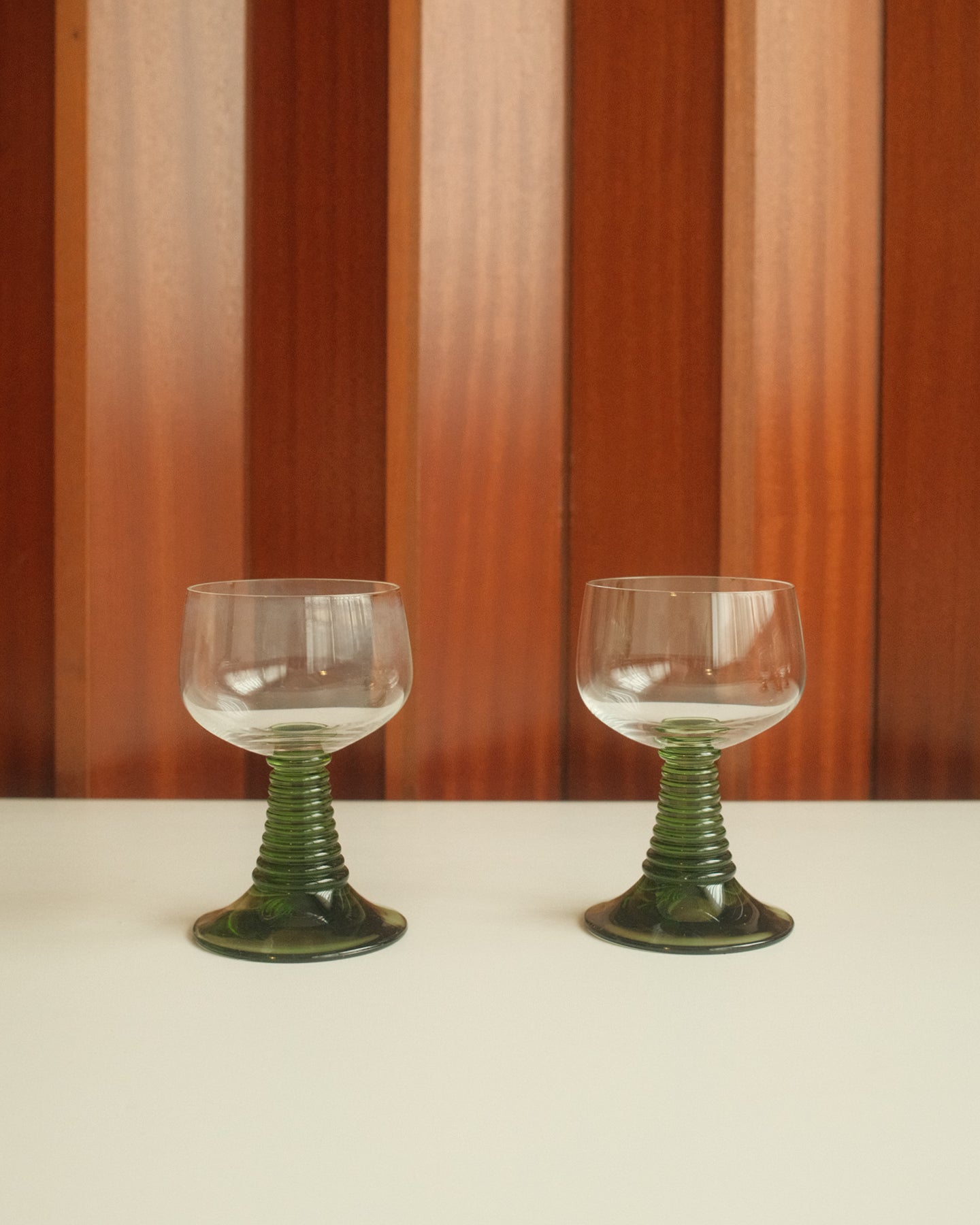 Six Roemer wine glasses with green stem
