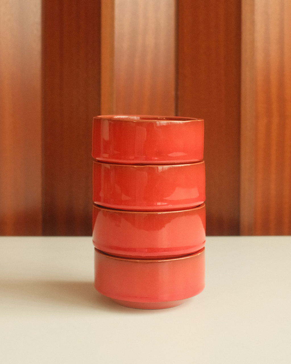 Set of four red ceramic bowls