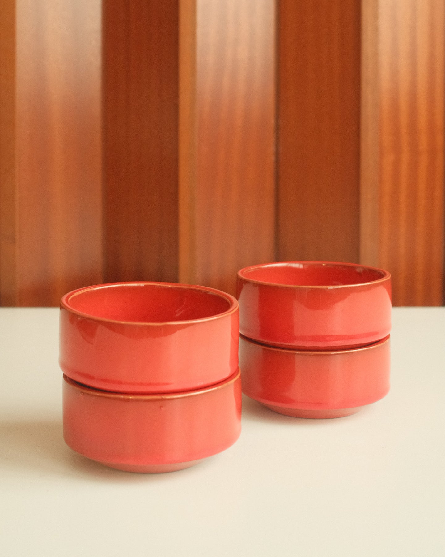 Set of four red ceramic bowls