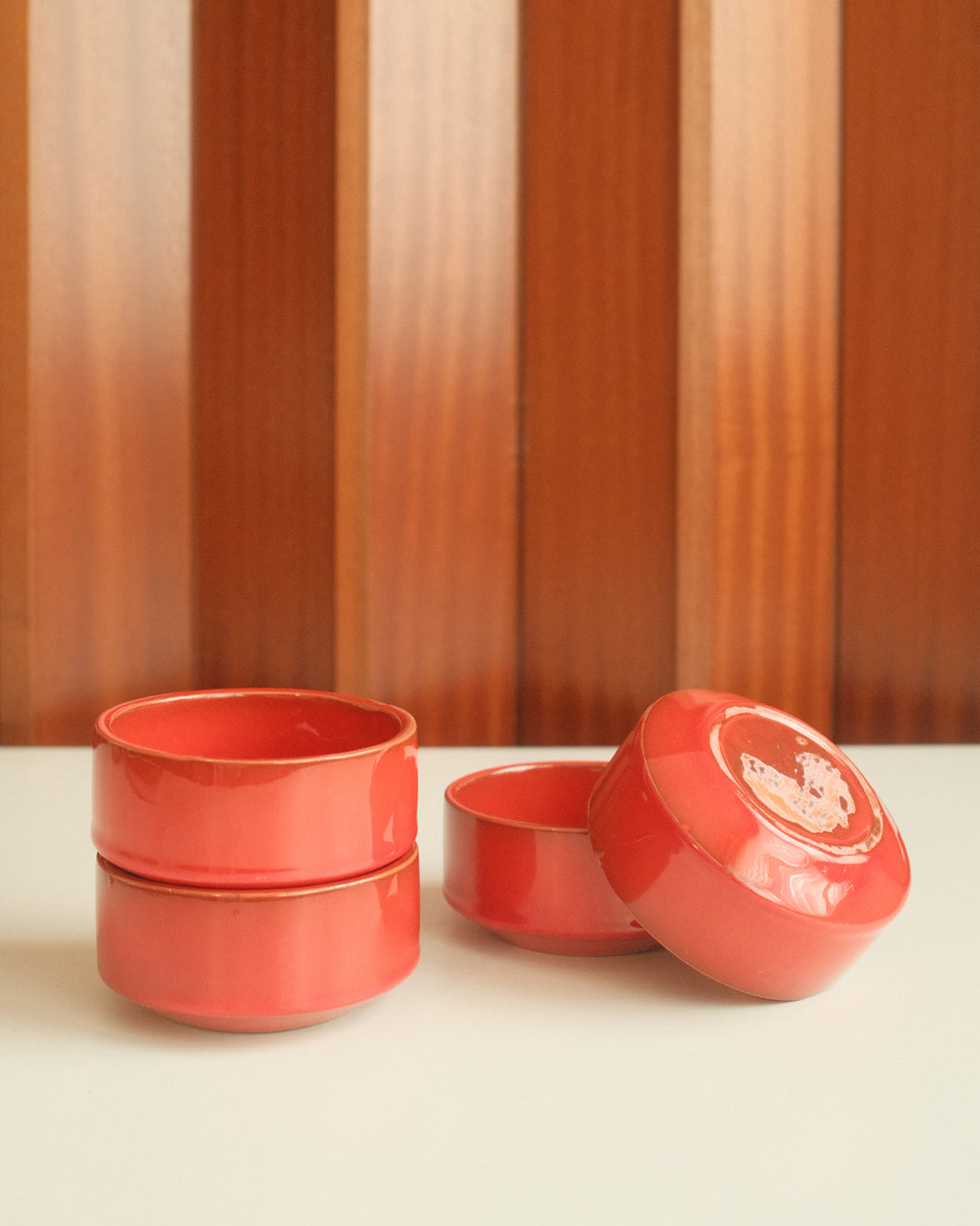 Set of four red ceramic bowls