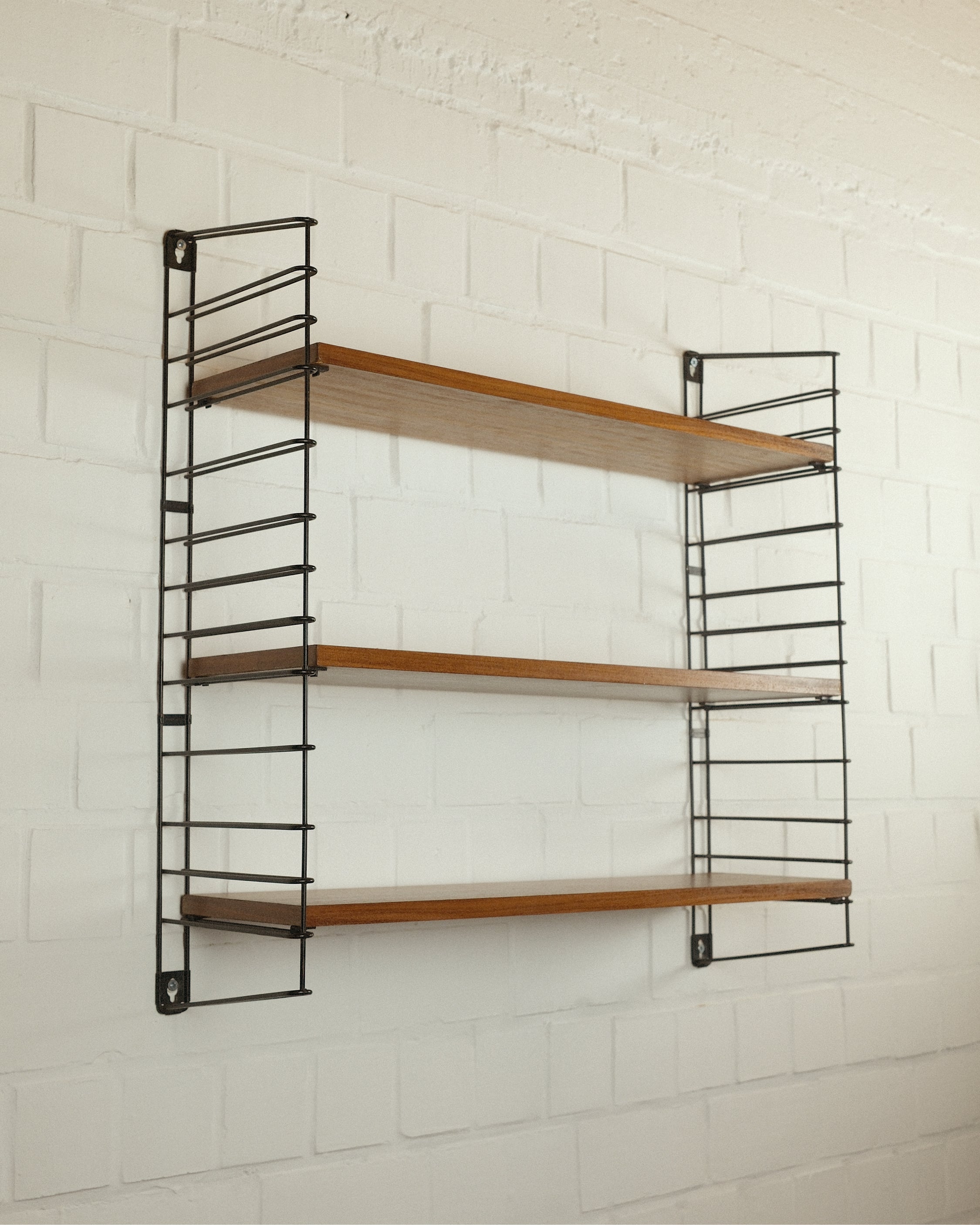 Wall rack, Adriaan Dekker⁠, Tomado