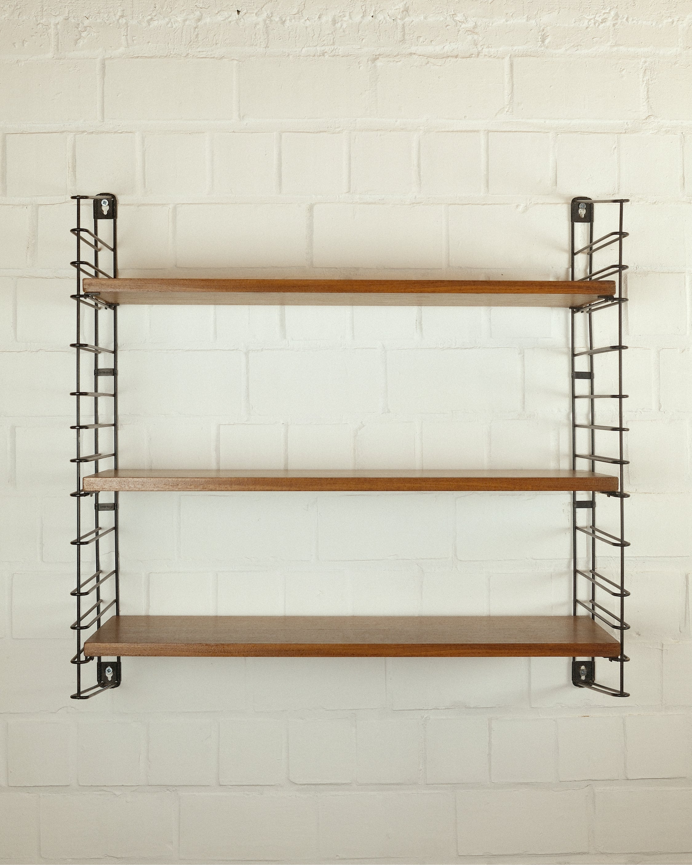 Wall rack, Adriaan Dekker⁠, Tomado